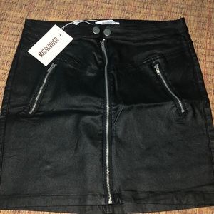 Black coated zip front skirt in new condition